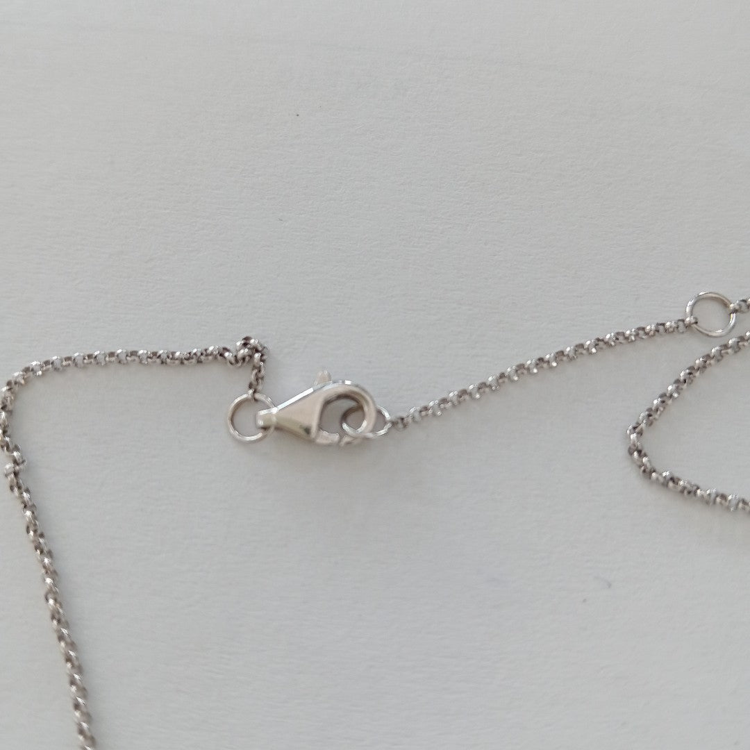 CADENA, DIJE ORO BLANCO 18 K 3.5 GRMS (SEMINUEVO)