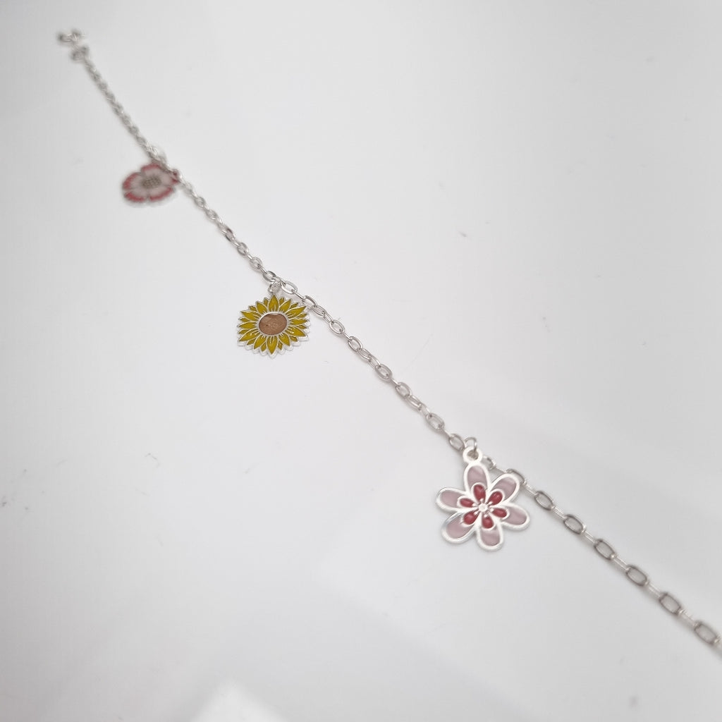 PULSERA TEJIDO ESPECIAL CON DIJE FLORES PLATA .925 21 CM 2.3 GR (NUEVO)