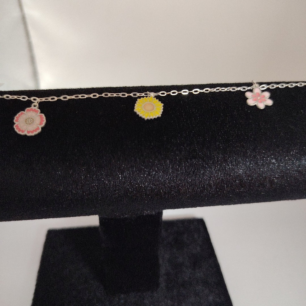 PULSERA TEJIDO ESPECIAL CON DIJE FLORES PLATA .925 21 CM 2.3 GR (NUEVO)
