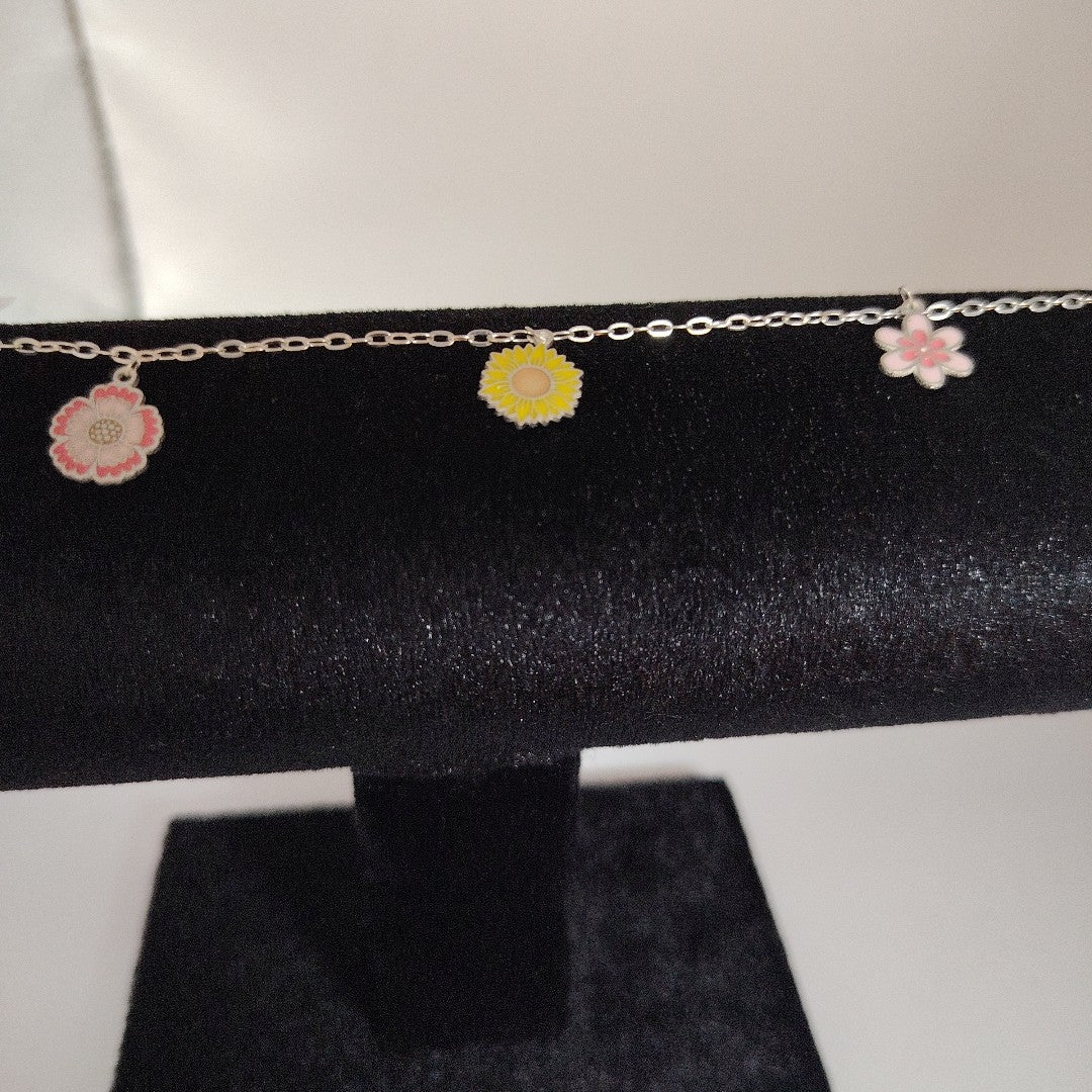 PULSERA TEJIDO ESPECIAL CON DIJE FLORES PLATA .925 21 CM 2.3 GR (NUEVO)