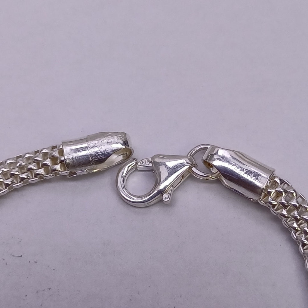 PULSERA TEJIDO ESPECIAL PLATA .925 18 CM 4.9 GR (NUEVO)