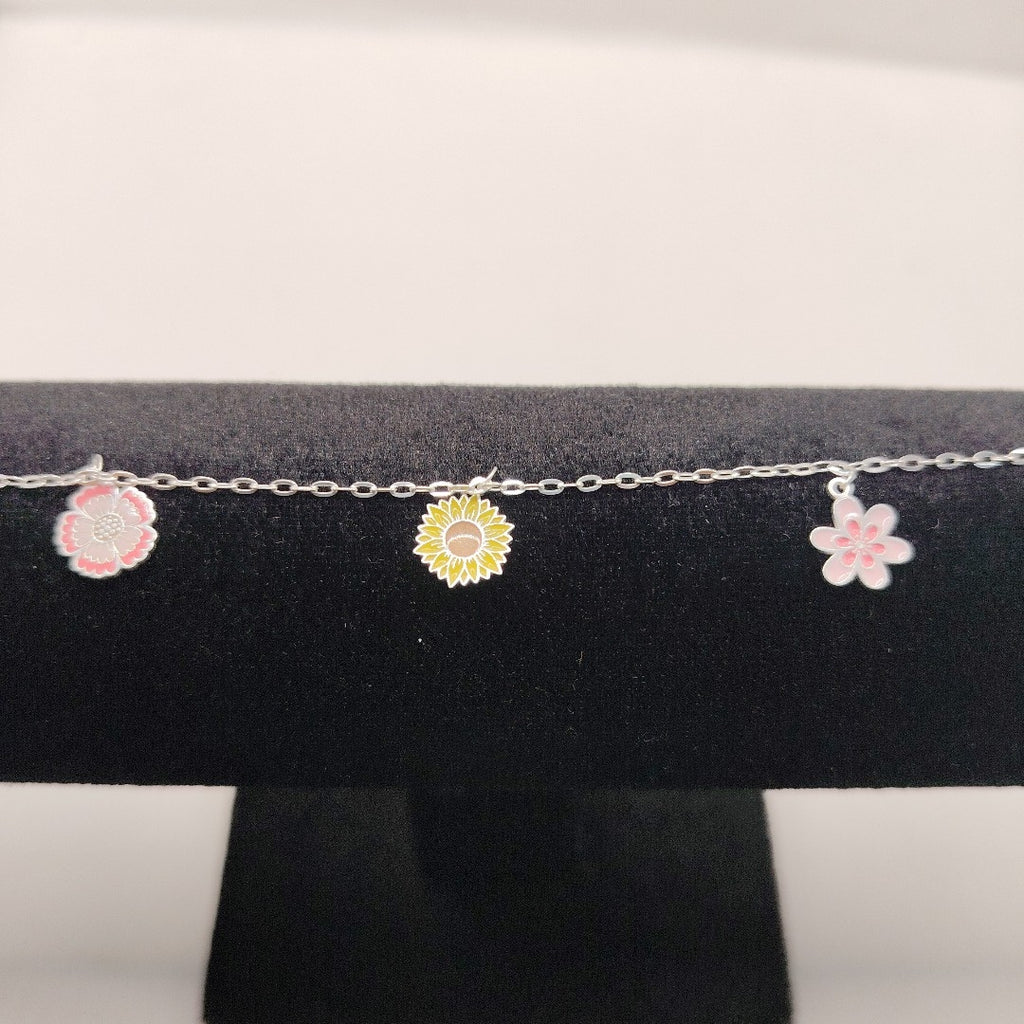 PULSERA TEJIDO ESPECIAL CON DIJE FLORES PLATA .925 21 CM 2.3 GR (NUEVO)