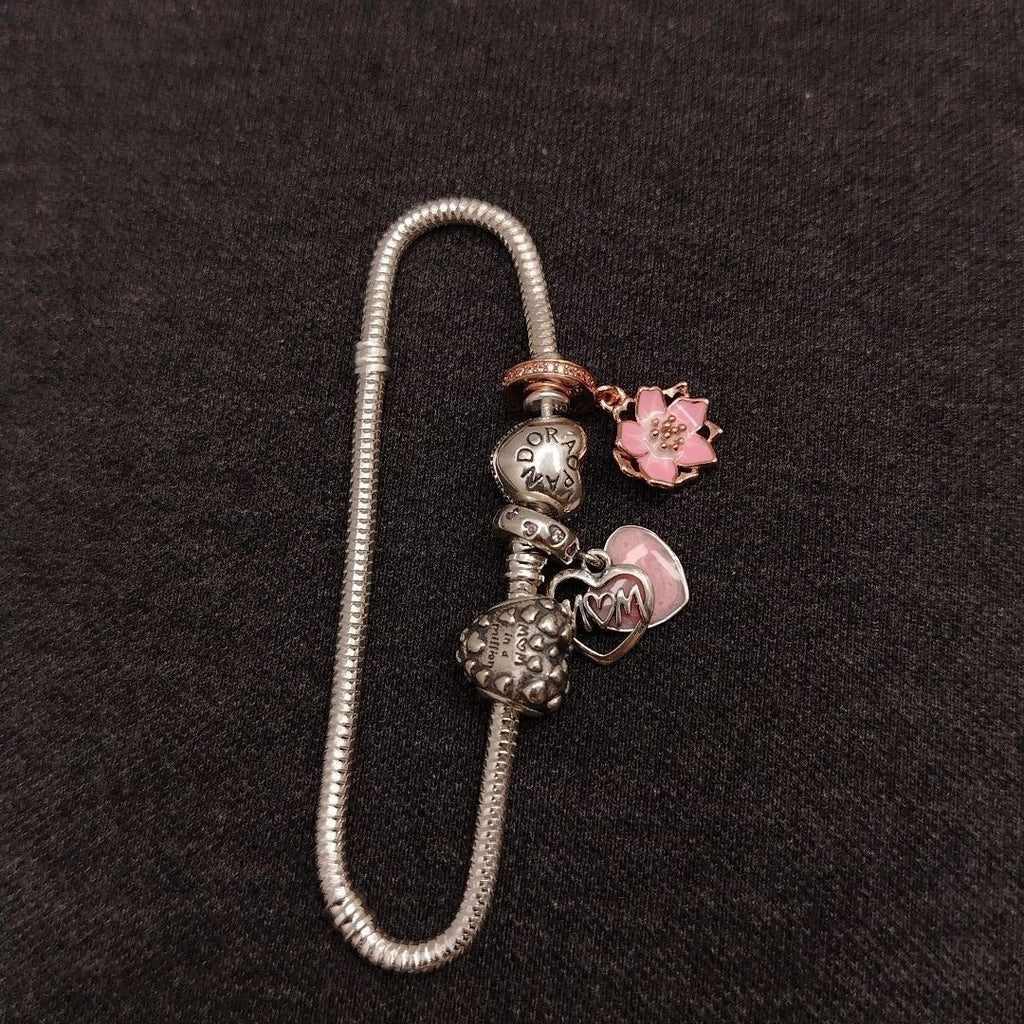 PULSERA TEJIDO ARTICULADA CON CHARMS PLATA .925 18 CM 15.2 GR (NUEVO)