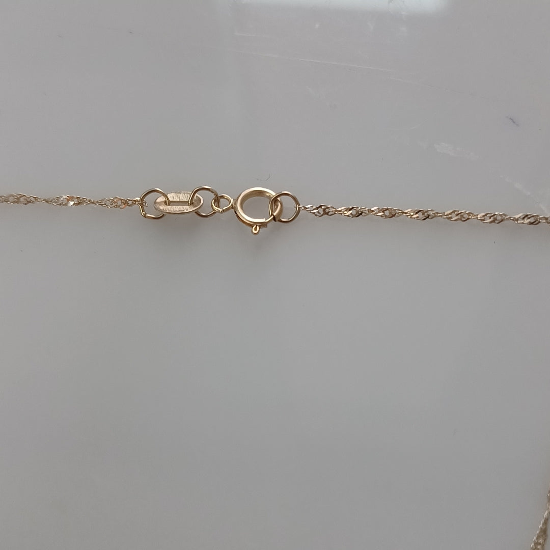 CADENA, DIJE ORO 10 K 2.5 GRMS (SEMINUEVO)
