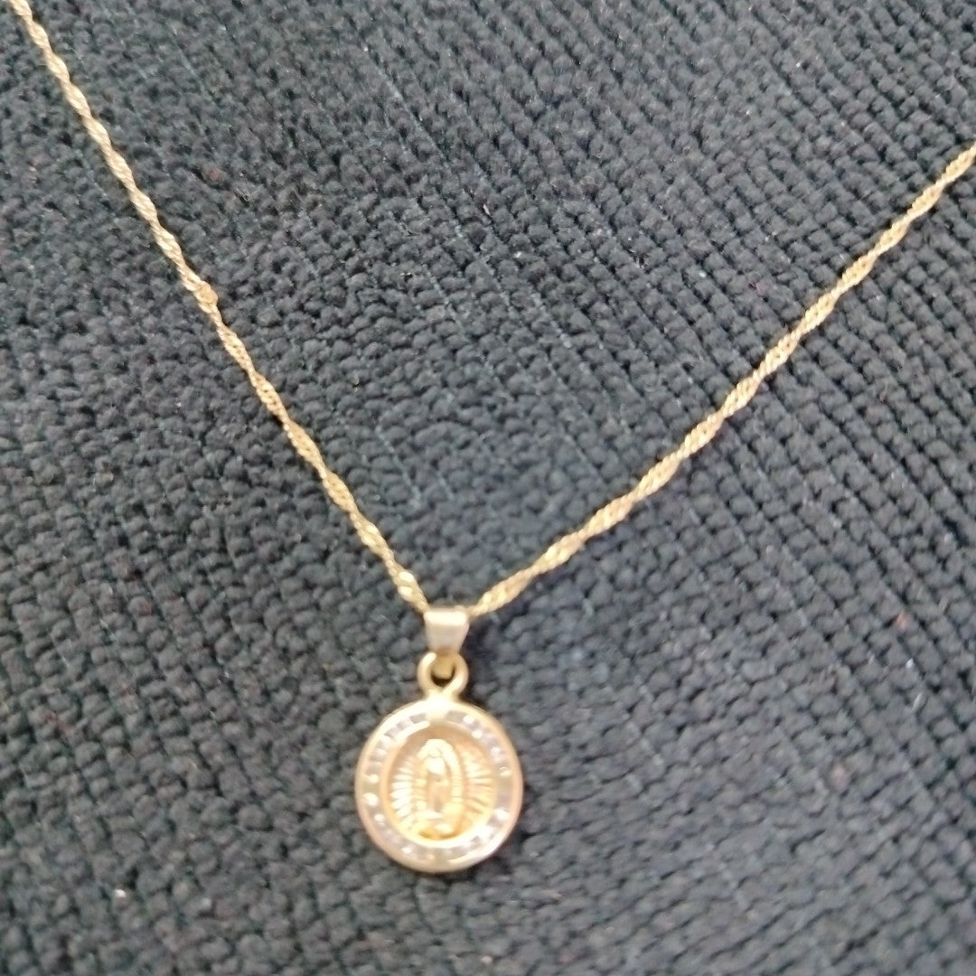 CADENA,MEDALLA RELIGIOSA ORO 10 K 1,60 GRMS (SEMINUEVO)