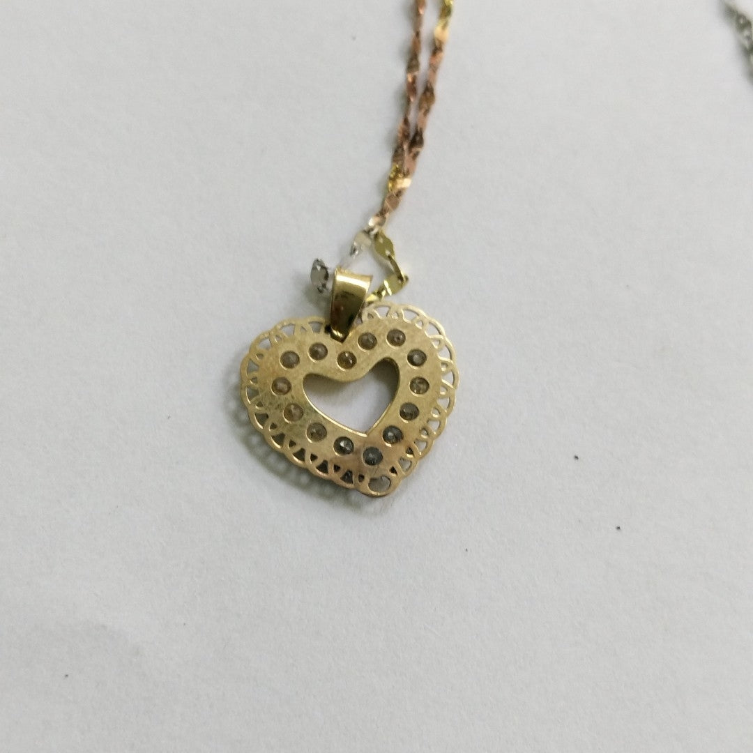 CADENA, DIJE ORO, ORO COMBINADO 10 K 1.3 GRMS (SEMINUEVO)
