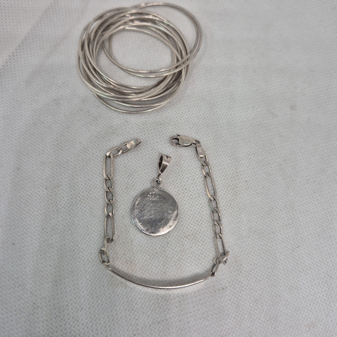 DIJE, ESCLAVA, OTRO PLATA 29.6 GRMS (SEMINUEVO)