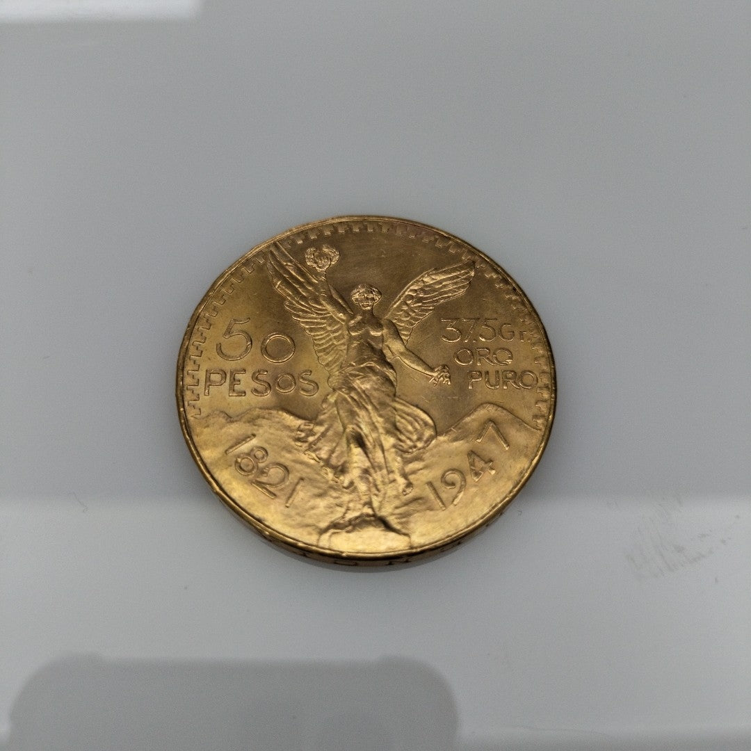 K1 41.6 GRMS 21 K IDENTIFICACIÓN MONEDA NOMINATIVA MATERIALES ORO CANTI (SEMINUEVO)
