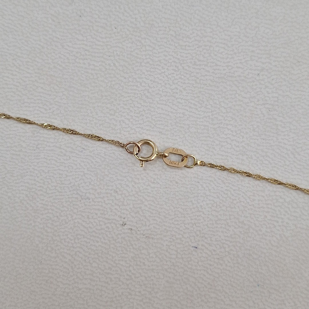CADENA, DIJE ORO 10 K 1.3 GRMS (SEMINUEVO)