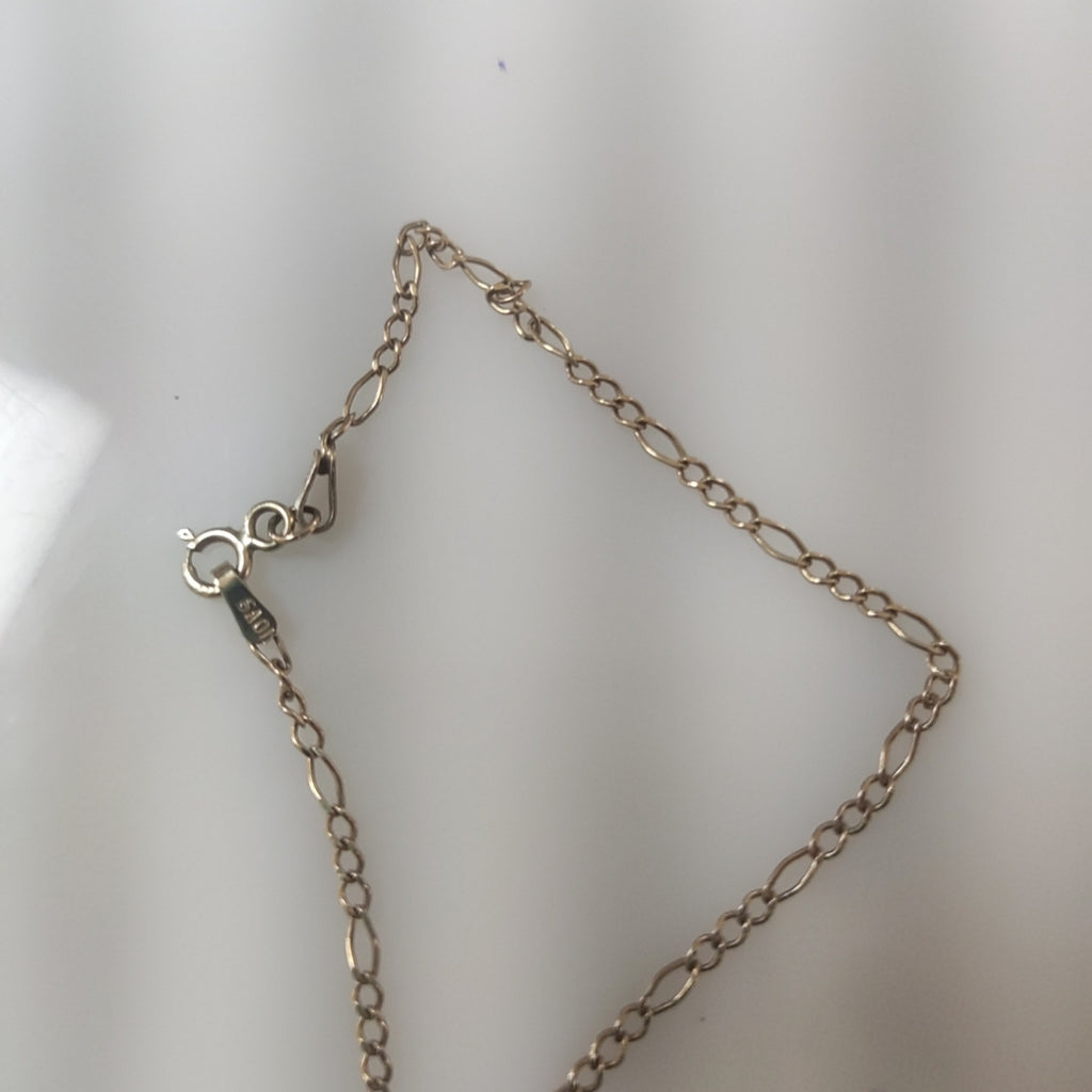 CADENA, DIJE ORO 10 K 2.5 GRMS (SEMINUEVO)