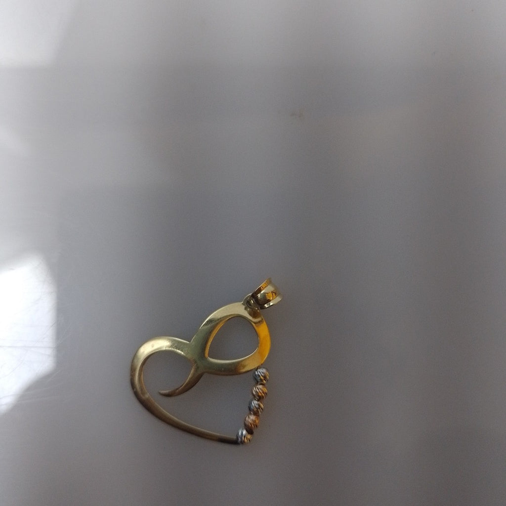 DIJE ORO, ORO COMBINADO 14 K 1 GRMS (SEMINUEVO)