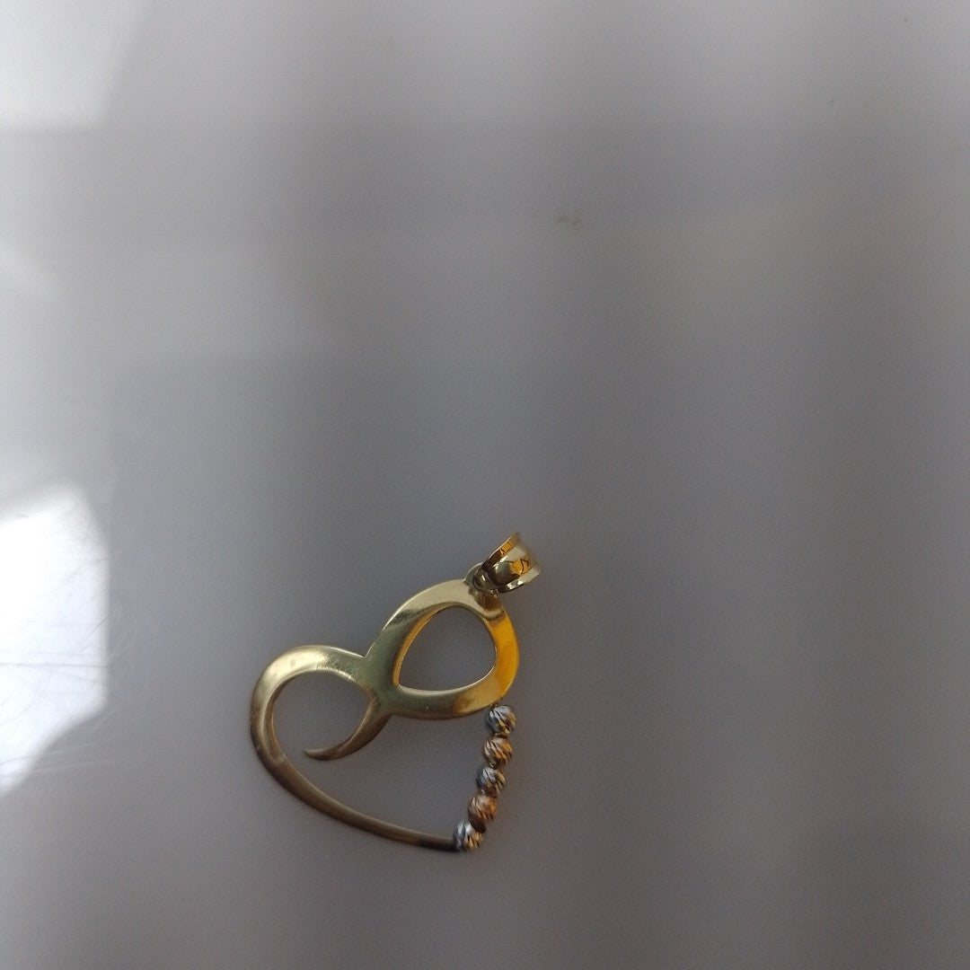 DIJE ORO, ORO COMBINADO 14 K 1 GRMS (SEMINUEVO)