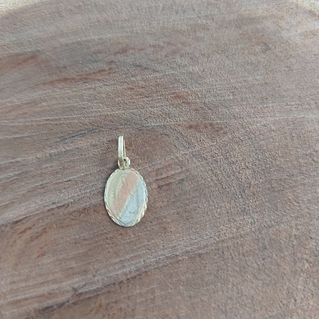 DIJE ORO 10 K 0.4 GRMS (SEMINUEVO)