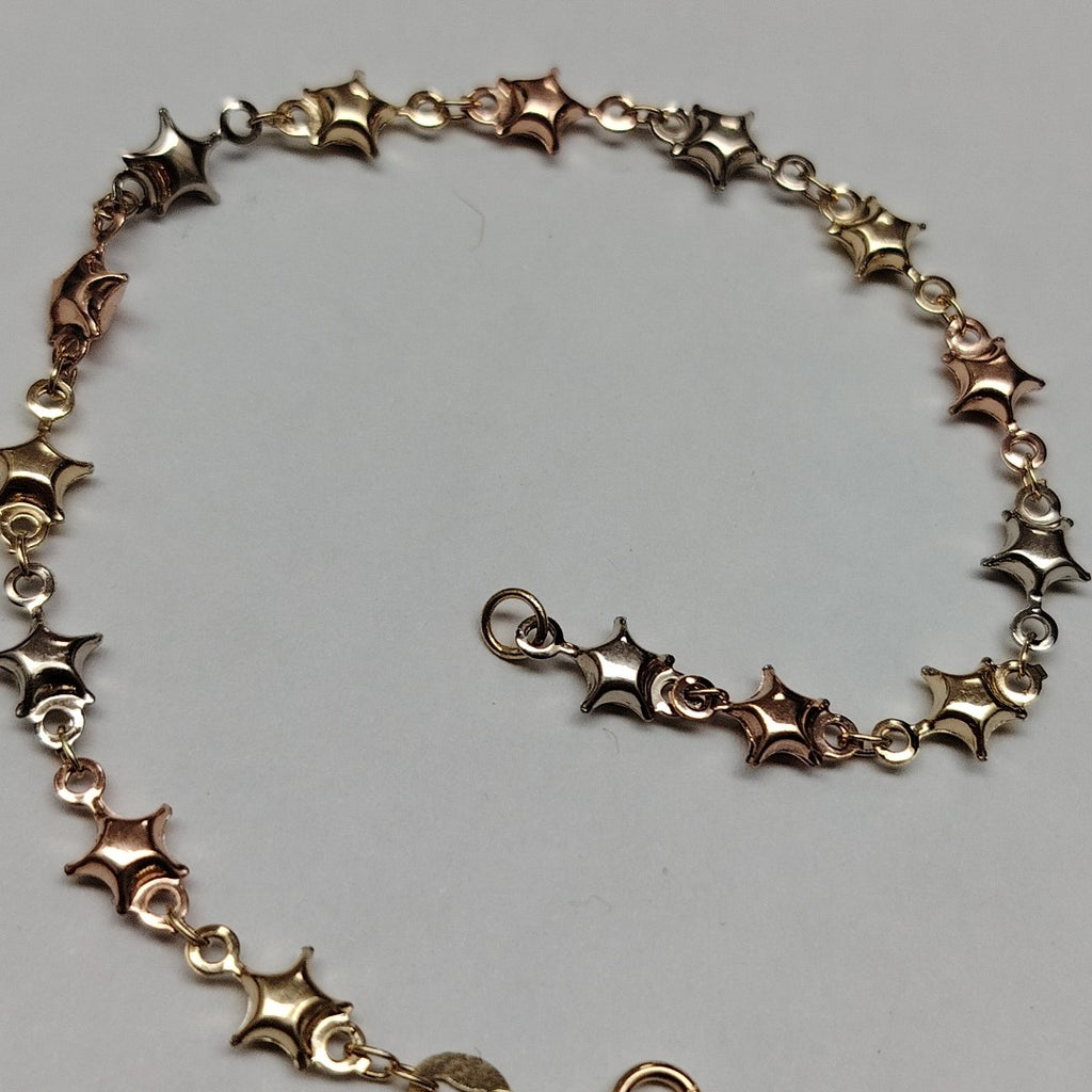 PULSERA TEJIDO ESPECIAL ESTRELLAS COMBINADAS 14K 18 CM 2.3 GR (NUEVO)