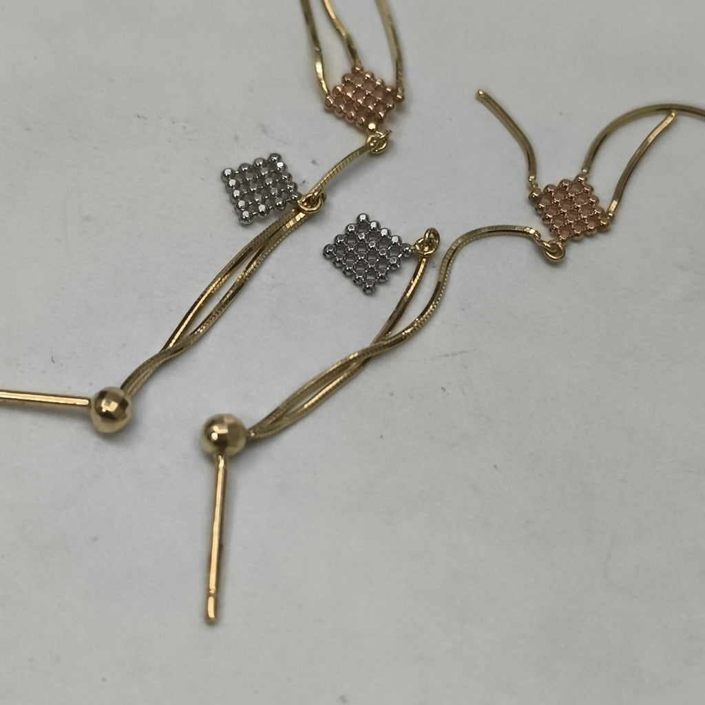 ARETES PAR ORO COMBINADO 14 K 1.4 GRMS (SEMINUEVO)