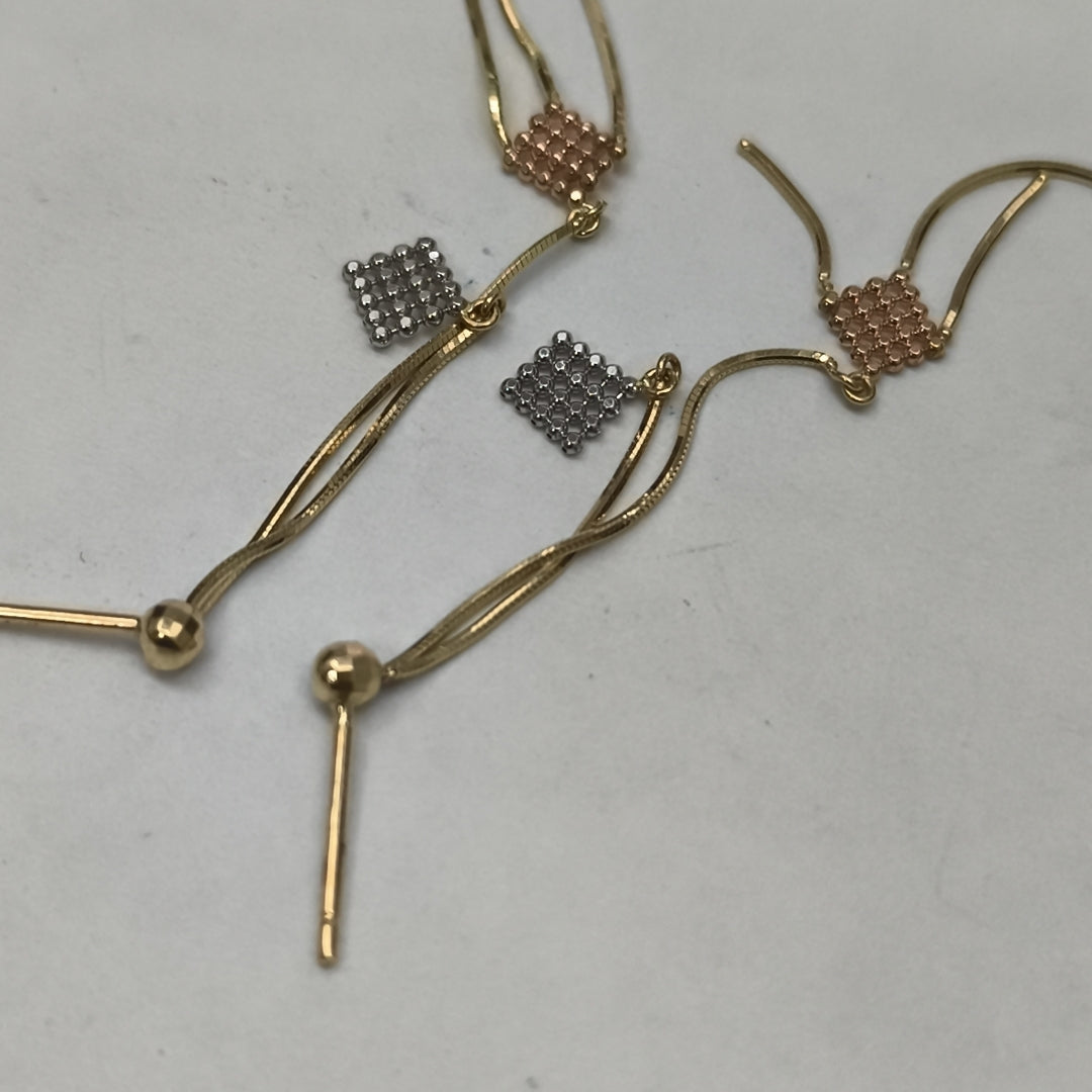 ARETES PAR ORO COMBINADO 14 K 1.4 GRMS (SEMINUEVO)