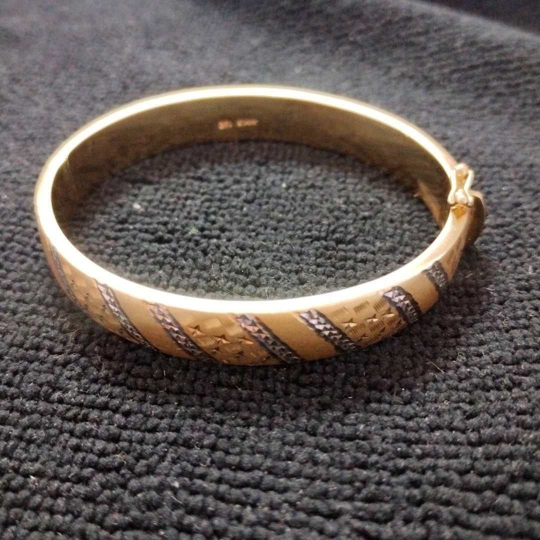 PULSERA RIGIDA ORO COMBINADO 14 K 16,50 GRMS (SEMINUEVO)