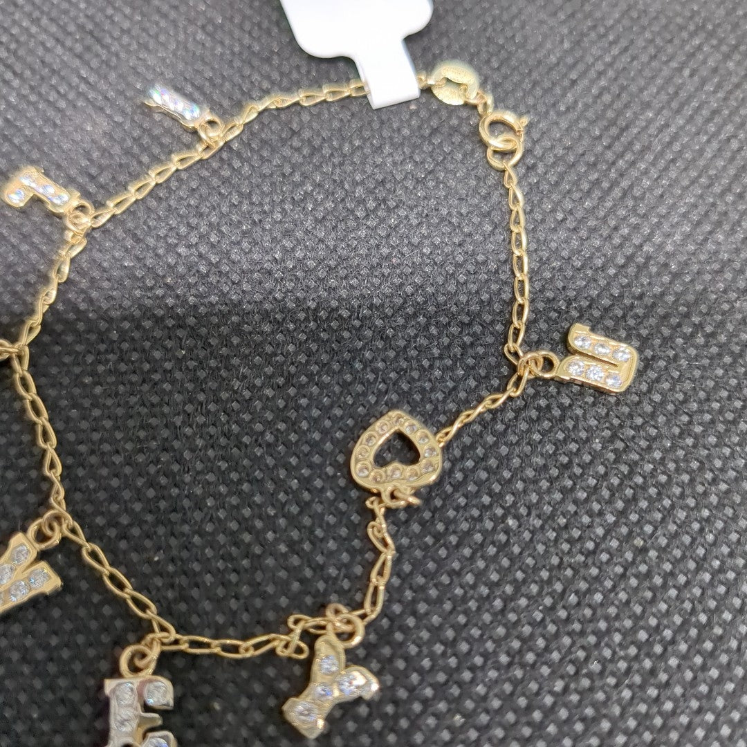 PULSERA ESPECIAL CON DIJES Y CIRCONIAS 14K 18 CM 3.3 GR (NUEVO)