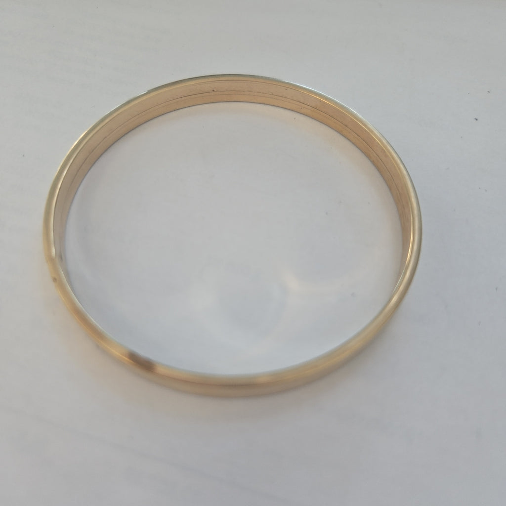 PULSERA RIGIDA ORO 10 K 7.7 GRMS (SEMINUEVO)