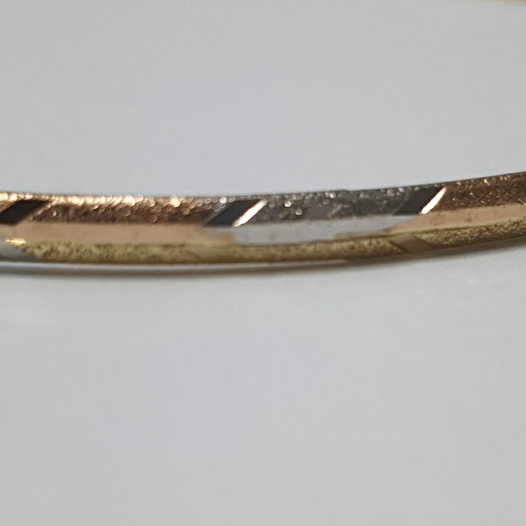 PULSERA RIGIDA ORO COMBINADO 10 K 3,30 GRMS (SEMINUEVO)
