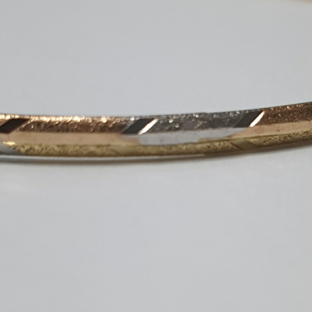 PULSERA RIGIDA ORO COMBINADO 10 K 3,30 GRMS (SEMINUEVO)