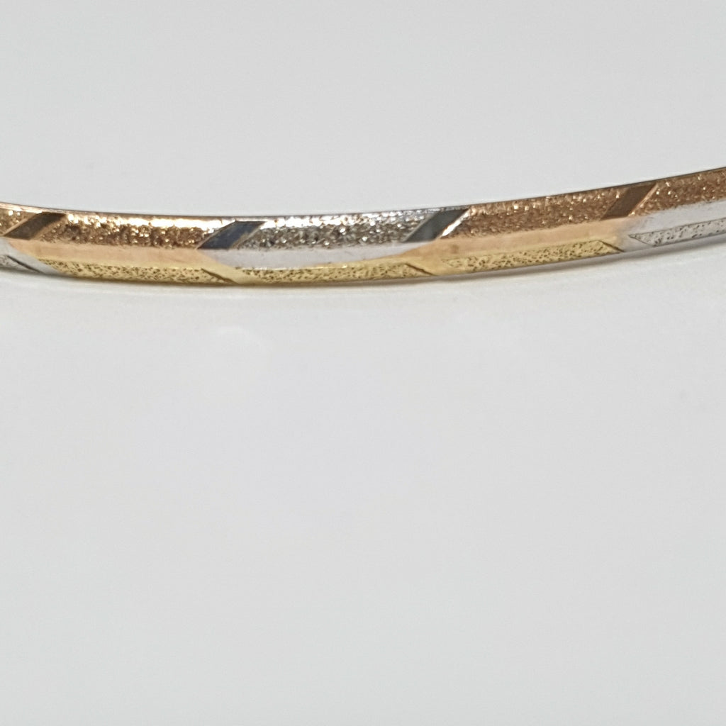 PULSERA RIGIDA ORO COMBINADO 10 K 3,10 GRMS (SEMINUEVO)