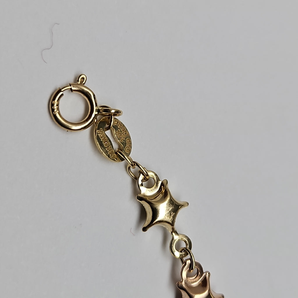 PULSERA TEJIDO ESPECIAL ESTRELLAS COMBINADAS 14K 18 CM 2.3 GR (NUEVO)