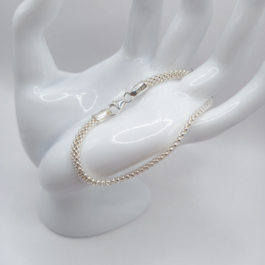 PULSERA TEJIDO ESPECIAL PLATA .925 18 CM 4.9 GR (NUEVO)