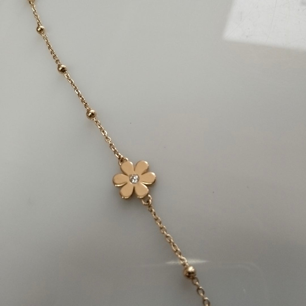 PULSERA TEJIDO ESPECIAL FLOR CON CIRCONIA 14K 18 CM 2.6 GR (NUEVO)