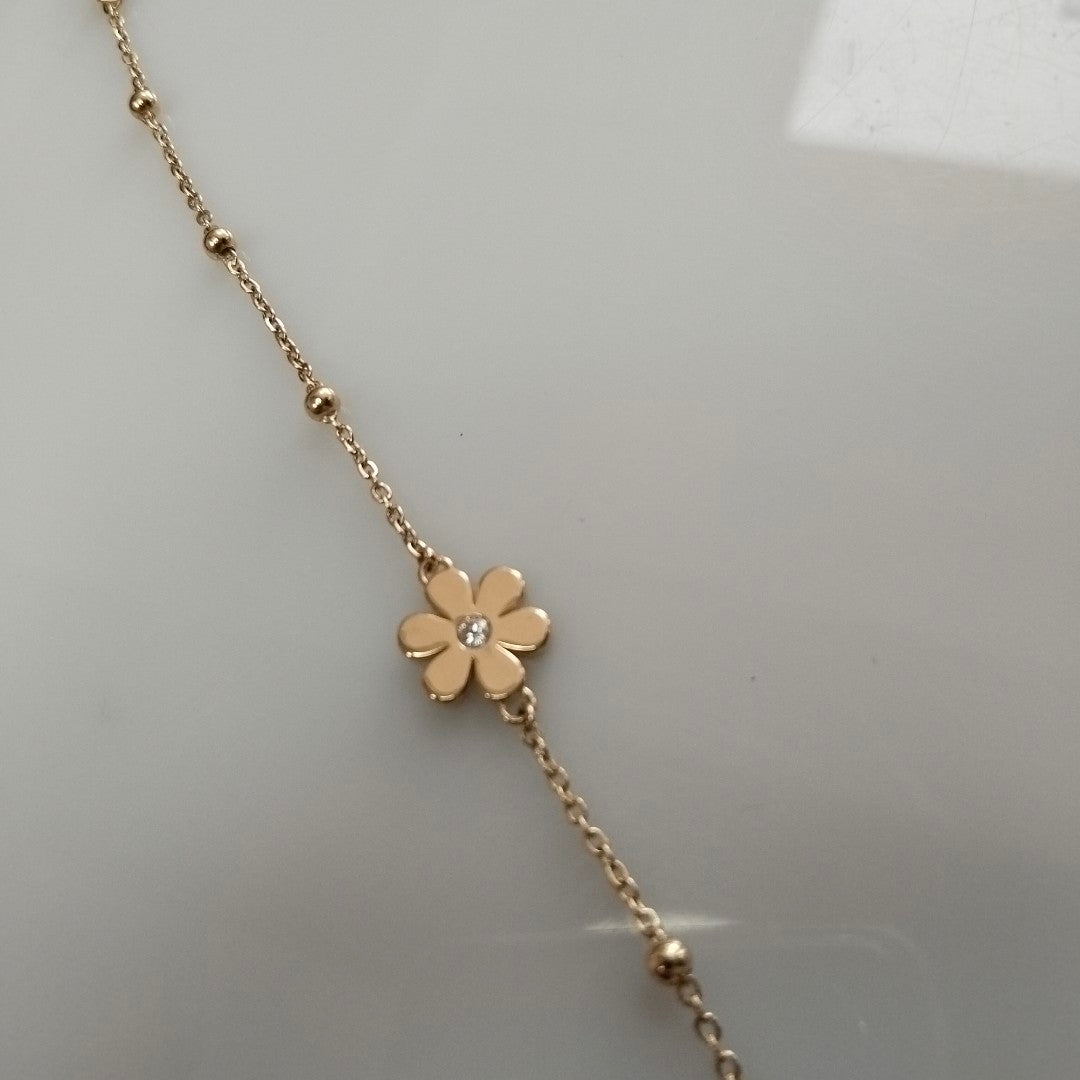 PULSERA TEJIDO ESPECIAL FLOR CON CIRCONIA 14K 18 CM 2.6 GR (NUEVO)