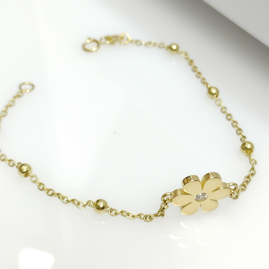PULSERA TEJIDO ESPECIAL FLOR CON CIRCONIA 14K 18 CM 2.5 GR (NUEVO)