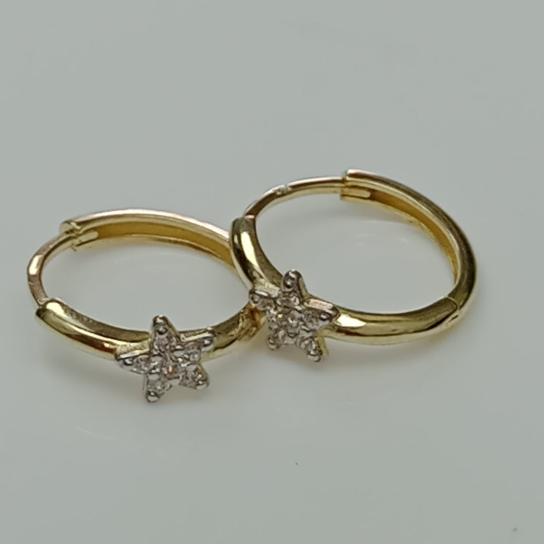 ARETES ARRACADAS FIG ESTRELLA CIRCONIAS 10K 1.6 GR (NUEVO)