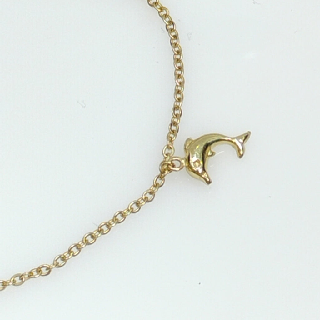 PULSERA ESPECIAL CON DIJES DELFINES 10K 18 CM 2 GR (NUEVO)
