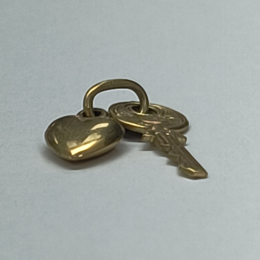 DIJE ORO 14 K 1,10 GRMS (SEMINUEVO)