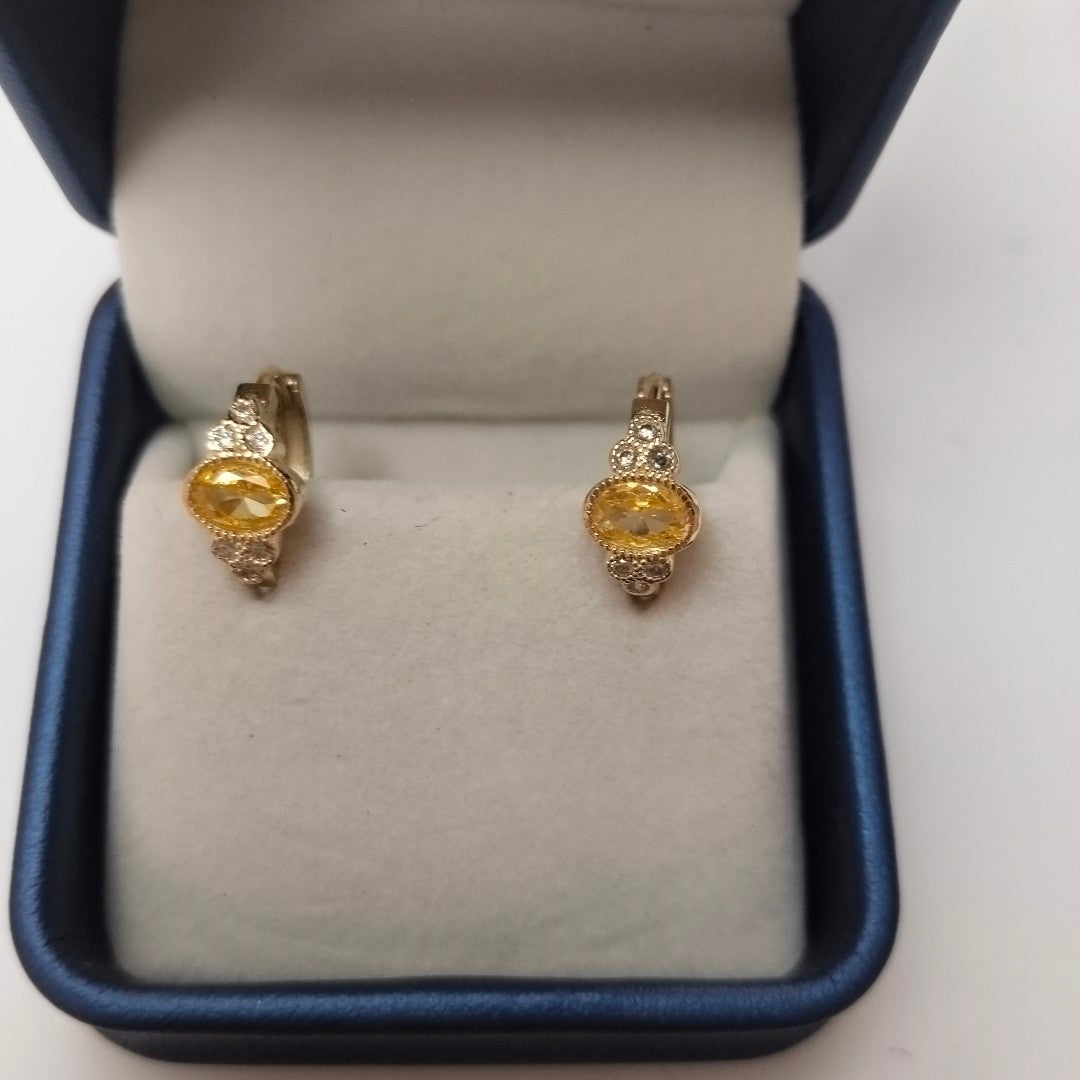 ARETES ARRACADAS CON CIRCONIAS Y PDRAS COL 14K 3.2 GR (NUEVO)