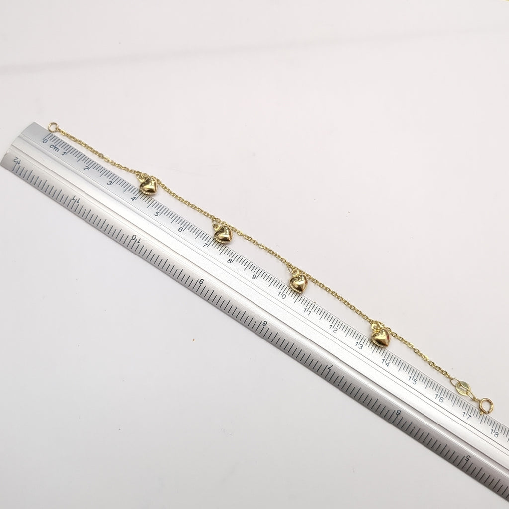 PULSERA ESP CON FIG CORAZONES 14K 18 CM 1.8 GR (NUEVO)