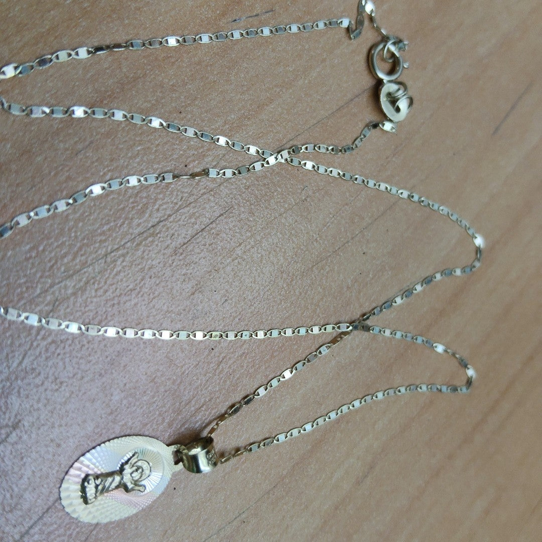 CADENA,MEDALLA RELIGIOSA ORO 10 K 1,10 GRMS (SEMINUEVO)