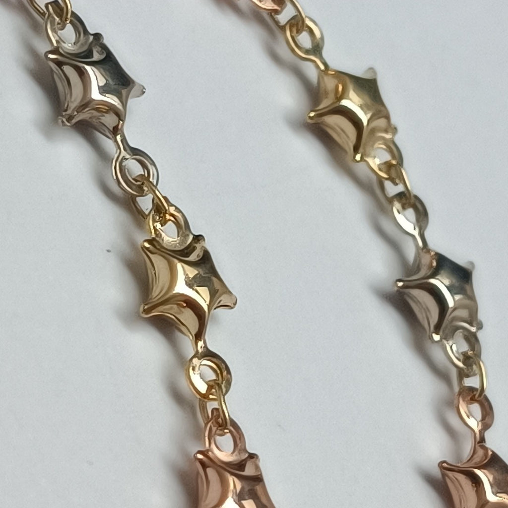 PULSERA TEJIDO ESPECIAL ESTRELLAS COMBINADAS 14K 18 CM 2.4 GR (NUEVO)