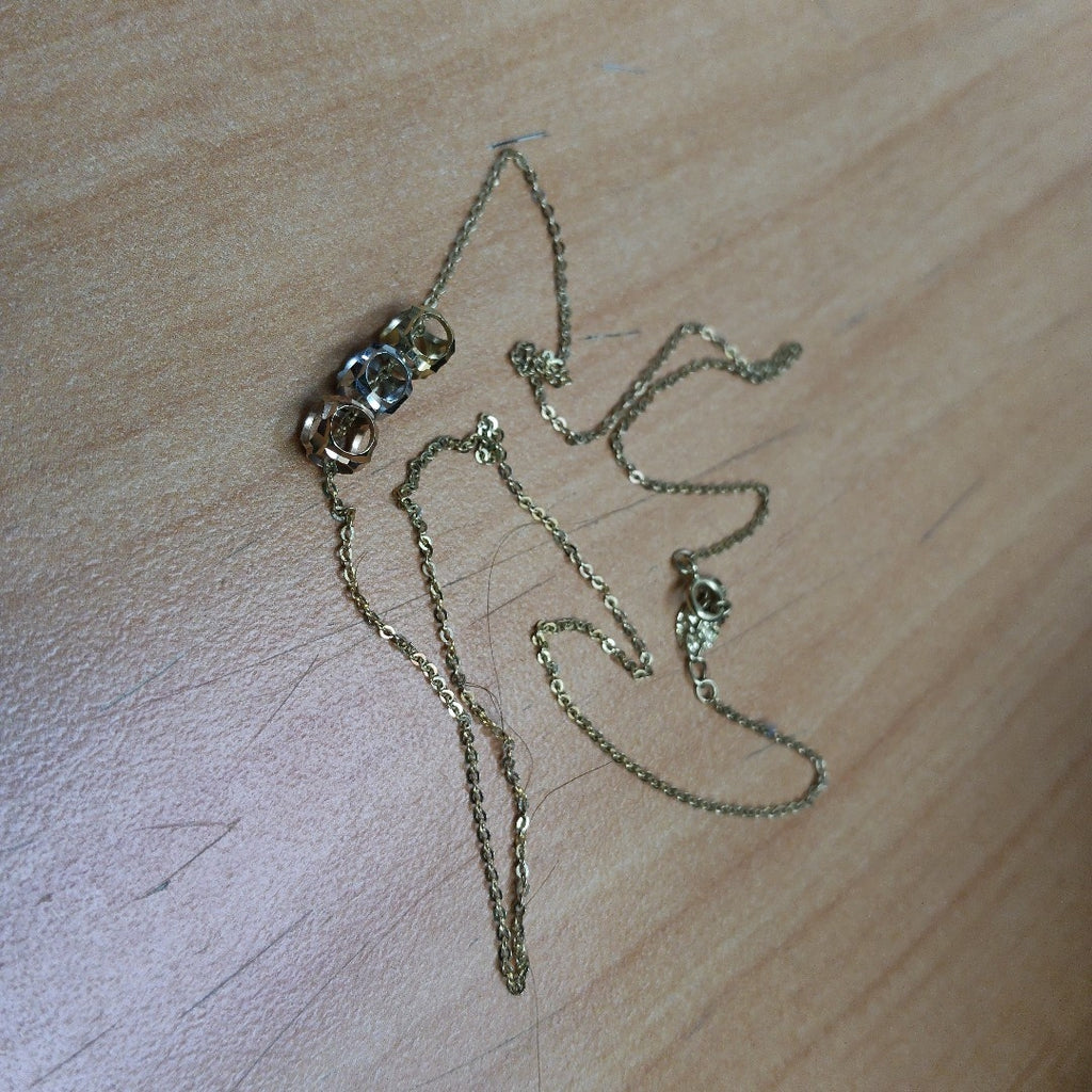 CADENA,DIJE ORO,ORO COMBINADO 14 K 1,60 GRMS (SEMINUEVO)