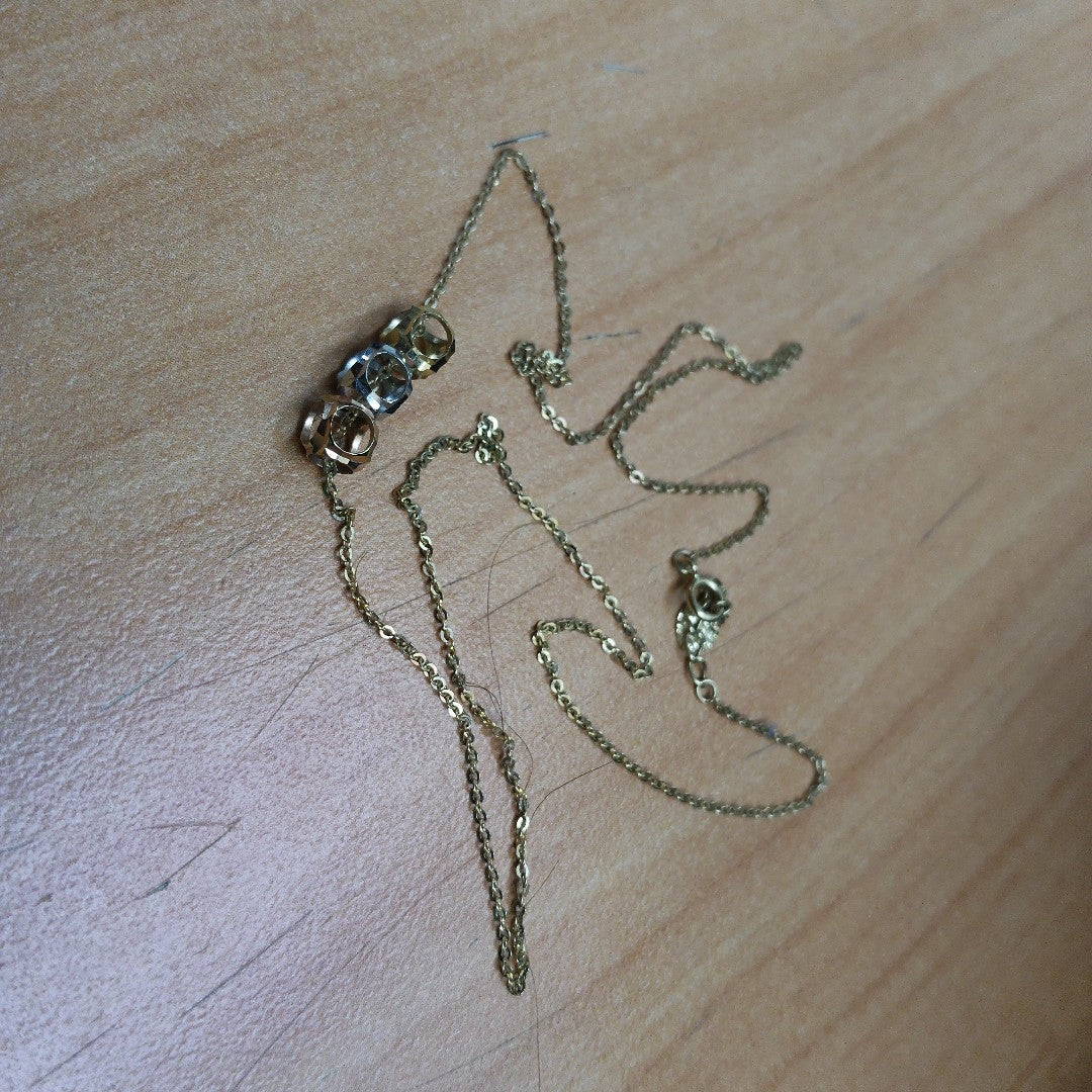 CADENA,DIJE ORO,ORO COMBINADO 14 K 1,60 GRMS (SEMINUEVO)