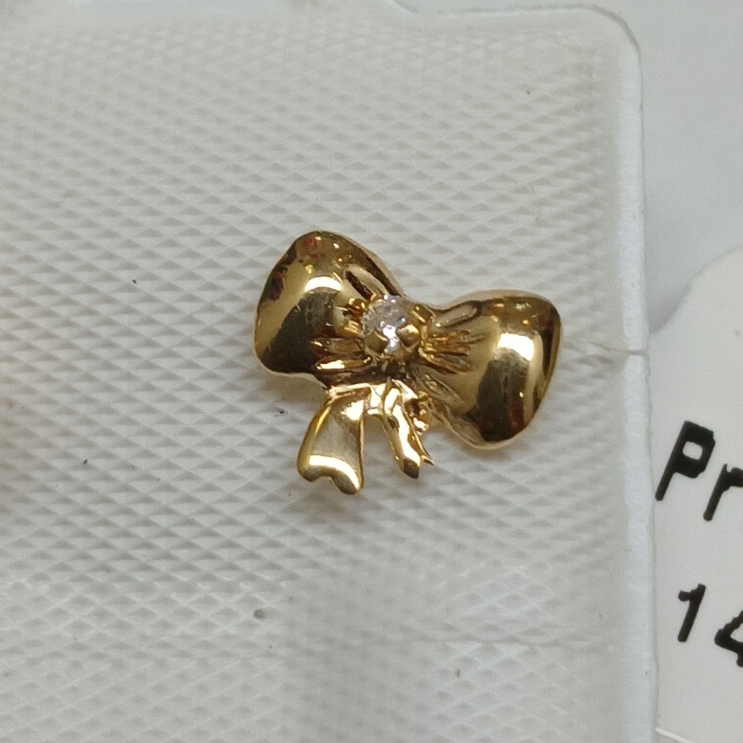 BROQUELES BROQUEL FIG MOÑO C CIRCONIA 14K 0.2441 GR (NUEVO)