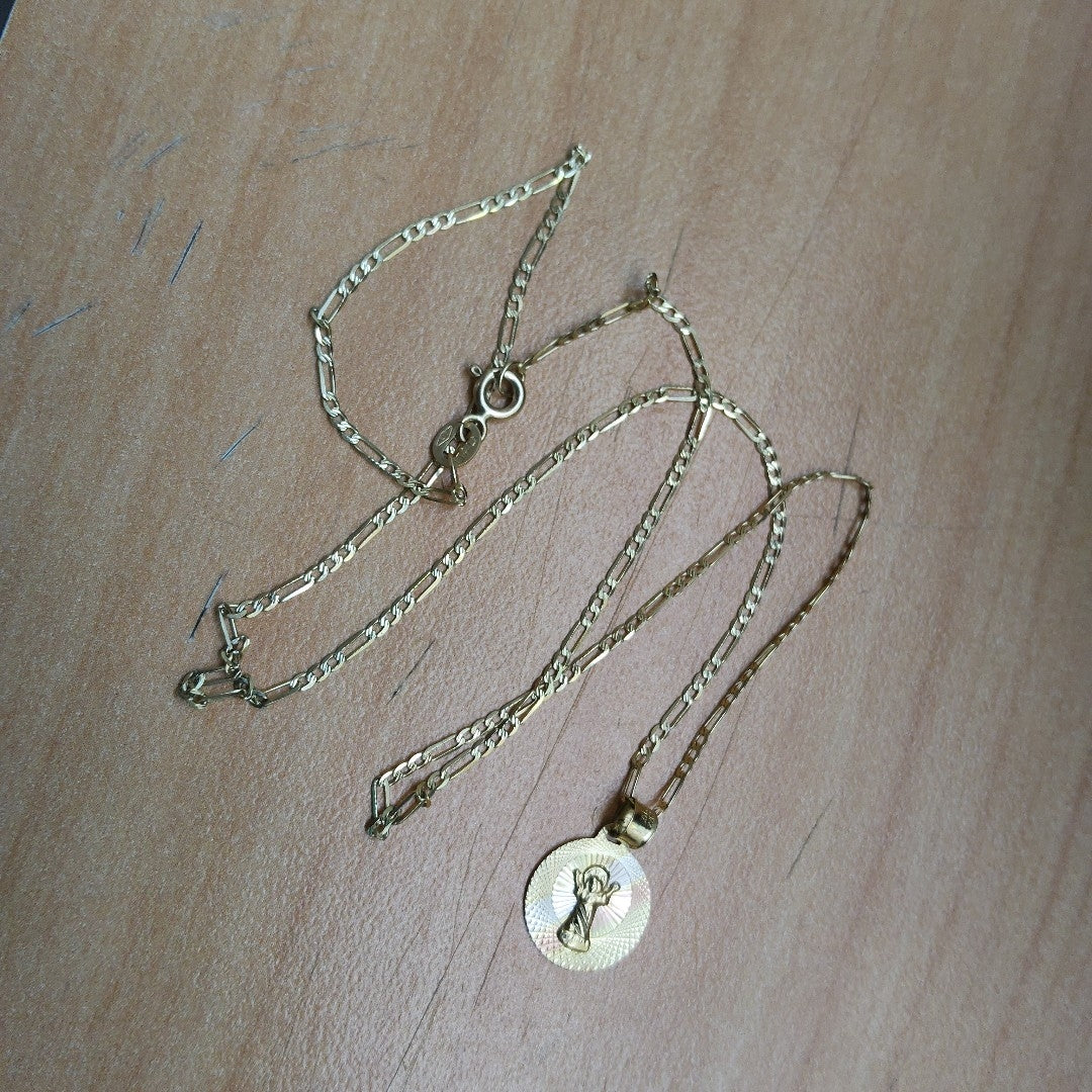 CADENA,MEDALLA RELIGIOSA ORO 10 K 1,90 GRMS (SEMINUEVO)