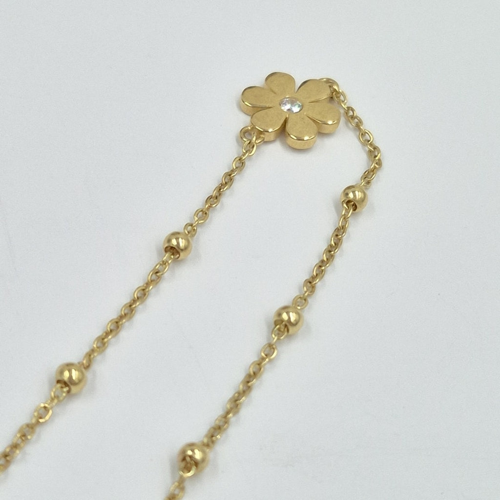PULSERA TEJIDO ESPECIAL FLOR CON CIRCONIA 14K 18 CM 2.4 GR (NUEVO)