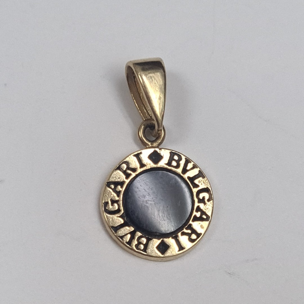 ARRACADAS PAR, DIJE ORO 14 K 1.3 GRMS (SEMINUEVO)