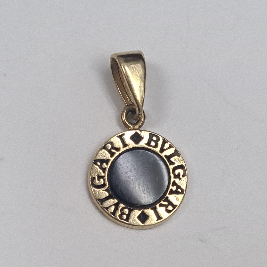ARRACADAS PAR, DIJE ORO 14 K 1.3 GRMS (SEMINUEVO)