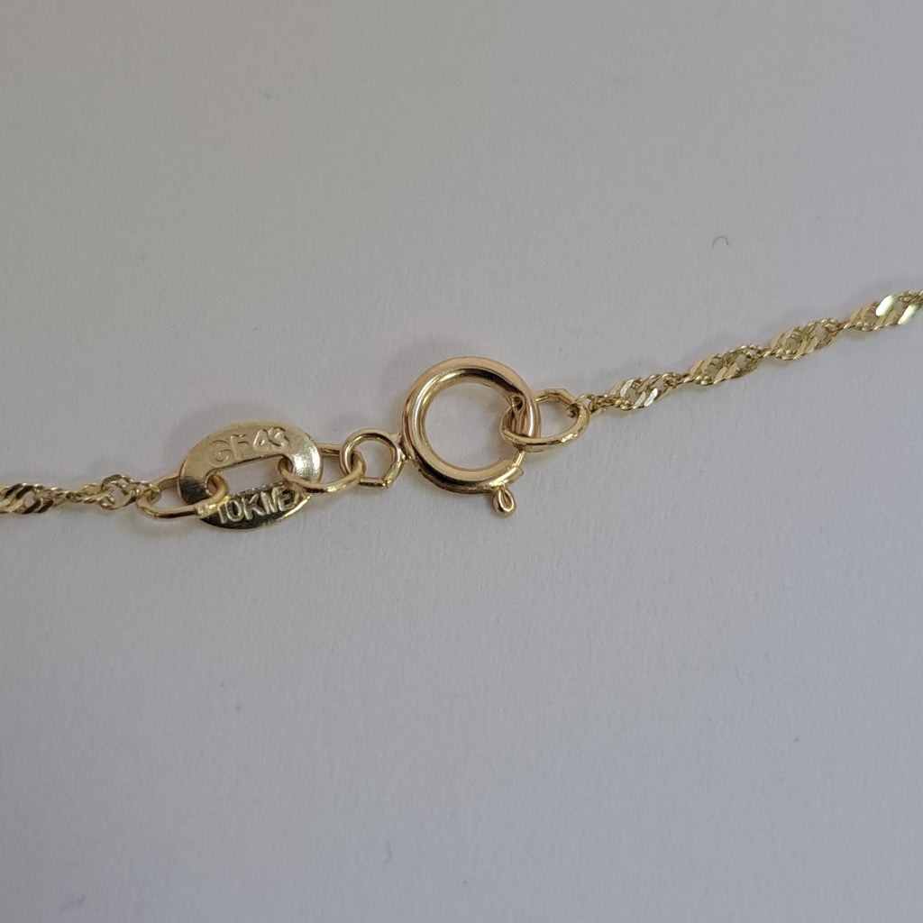 CADENA, DIJE ORO 10 K 2.2 GRMS (SEMINUEVO)