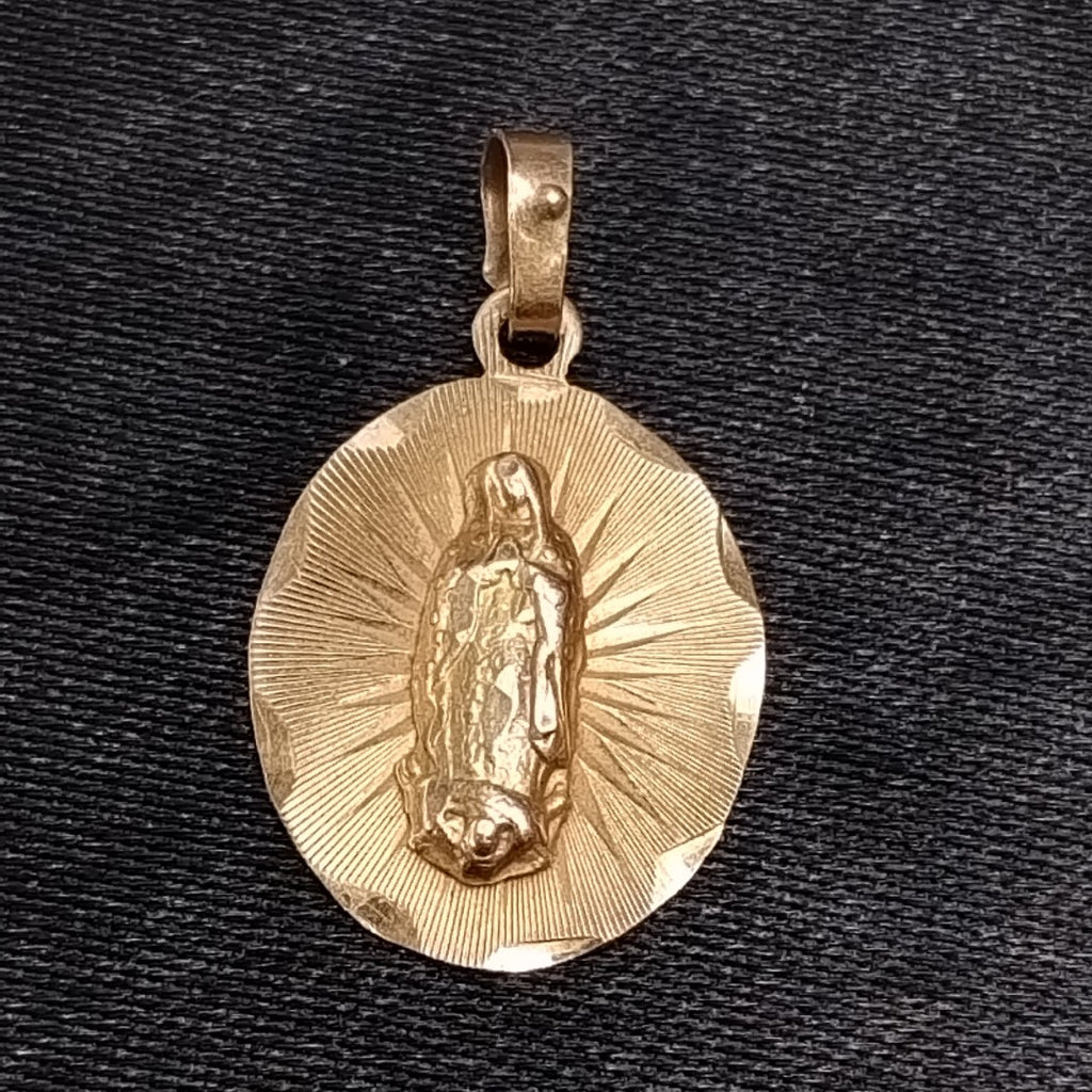 DIJE,MEDALLA RELIGIOSA ORO 10 K 1,20 GRMS (SEMINUEVO)
