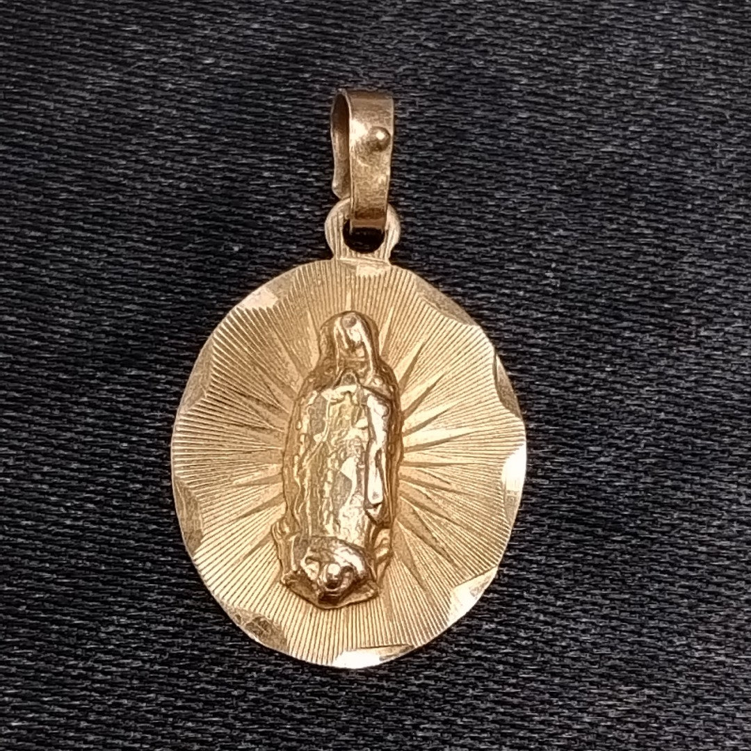 DIJE,MEDALLA RELIGIOSA ORO 10 K 1,20 GRMS (SEMINUEVO)