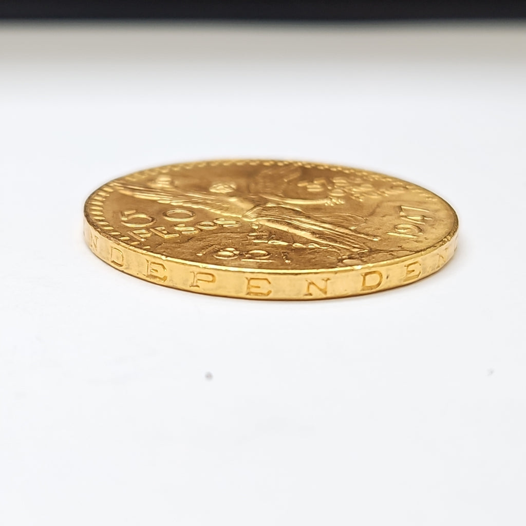 K1 41.6 GRMS 21 K IDENTIFICACIÓN MONEDA NOMINATIVA MATERIALES ORO CAN (SEMINUEVO)