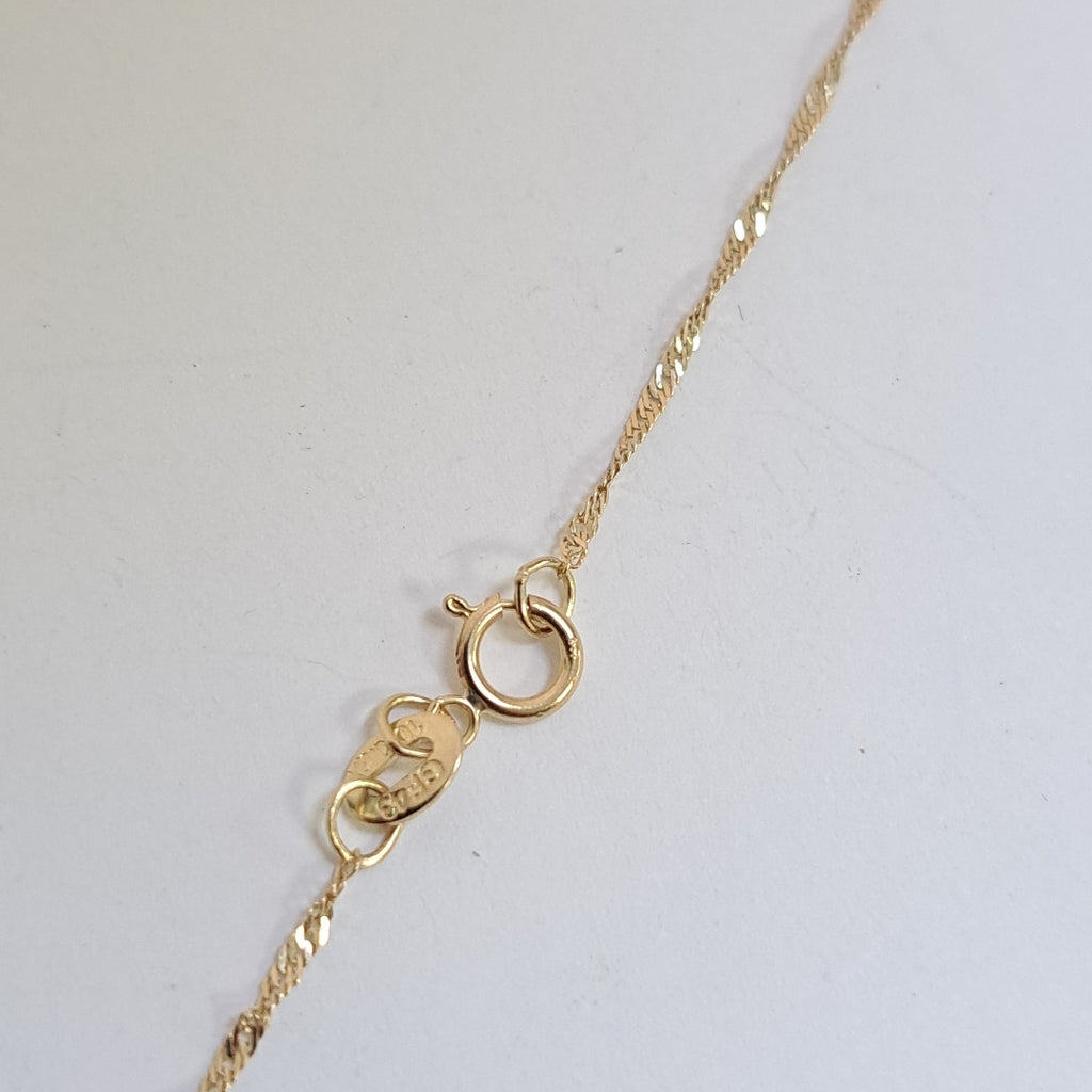 CADENA, DIJE ORO 10 K 2 GRMS (SEMINUEVO)